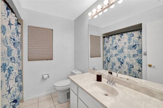53 Madagascar Ct, Marco Island, FL 34145 - bathroom featuring tile patterned floors, vanity, and a shower with curtain