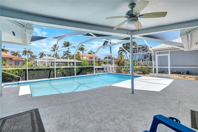 53 Madagascar Ct, Marco Island, FL 34145 - swimming pool featuring a patio, ceiling fan, and glass enclosure