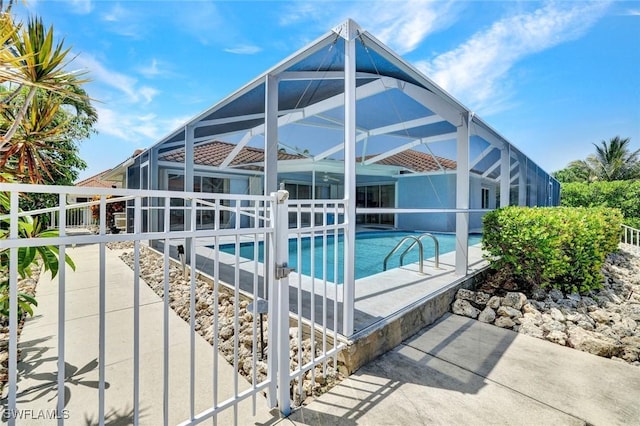 53 Madagascar Ct, Marco Island, FL 34145 - swimming pool with a patio area and glass enclosure