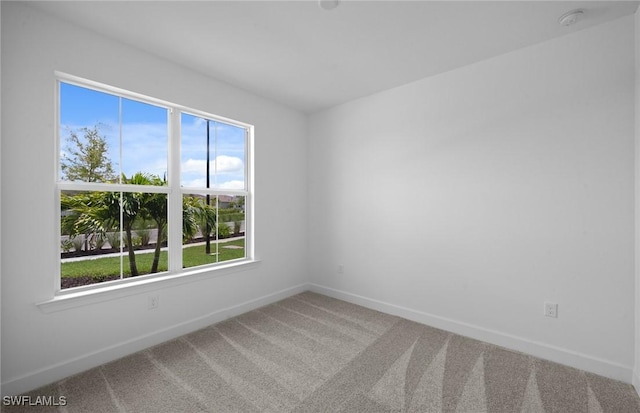 15850 Blue Ridge Way, Punta Gorda, FL 33982 - unfurnished room featuring carpet and a smoke detector