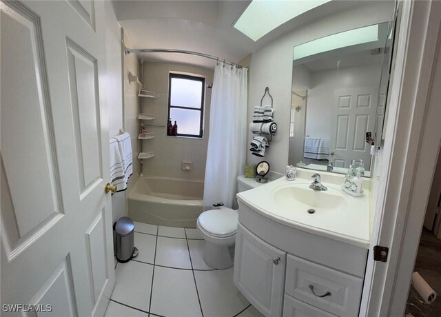 4090 32nd Ave SW, Naples, FL 34116 - bathroom featuring vanity, toilet, shower / tub combo, and tile patterned floors