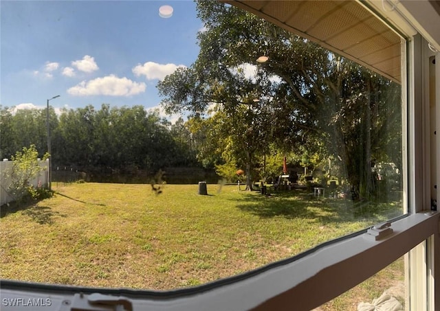 4090 32nd Ave SW, Naples, FL 34116 - view of green lawn with view of wooded area