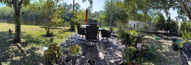 4090 32nd Ave SW, Naples, FL 34116 - view of patio / terrace featuring outdoor dining space
