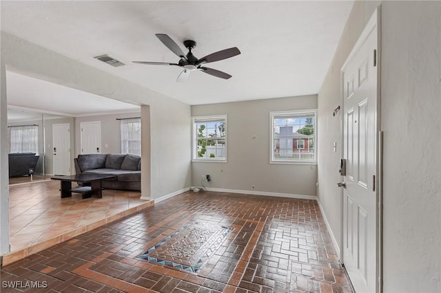 3018 Sunset Rd, Fort Myers, FL 33901 - entrance foyer featuring ceiling fan and brick floors