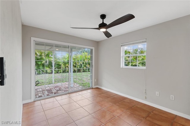 3018 Sunset Rd, Fort Myers, FL 33901 - tiled spare room with ceiling fan and baseboards
