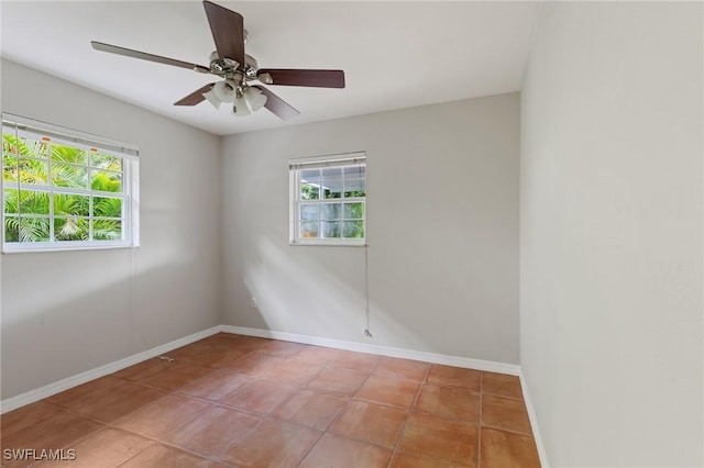 3018 Sunset Rd, Fort Myers, FL 33901 - tiled empty room with healthy amount of natural light and ceiling fan