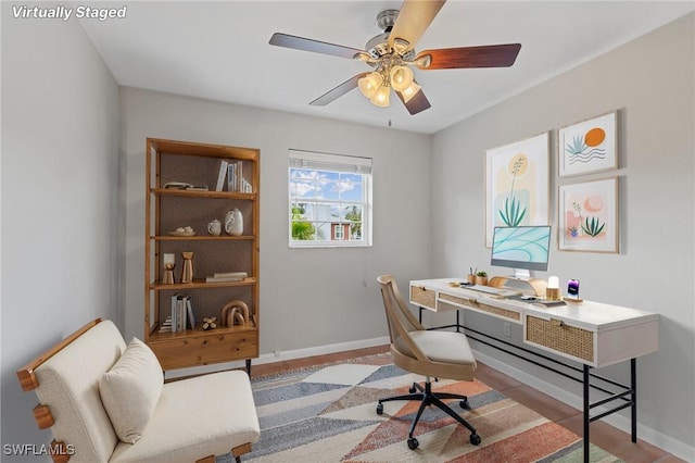 3018 Sunset Rd, Fort Myers, FL 33901 - home office with baseboards and a ceiling fan