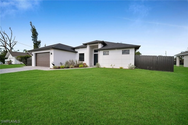 1921 SW 4th St, Cape Coral, FL 33991 - prairie-style home with driveway, a garage, stucco siding, and a shingled roof