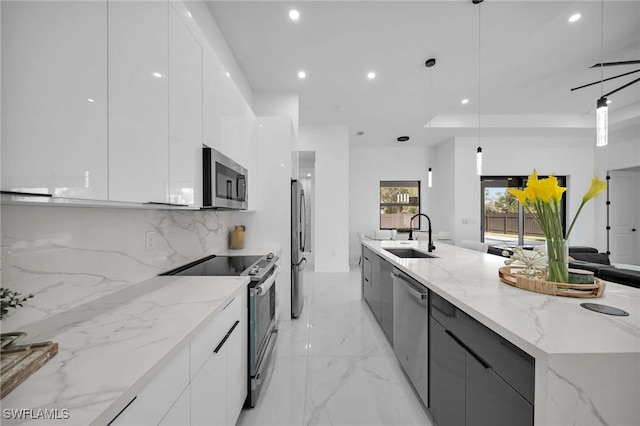 1921 SW 4th St, Cape Coral, FL 33991 - kitchen featuring modern cabinets, stainless steel appliances, a sink, backsplash, and recessed lighting