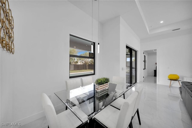 1921 SW 4th St, Cape Coral, FL 33991 - dining space featuring light marble finish floors, baseboards, and recessed lighting