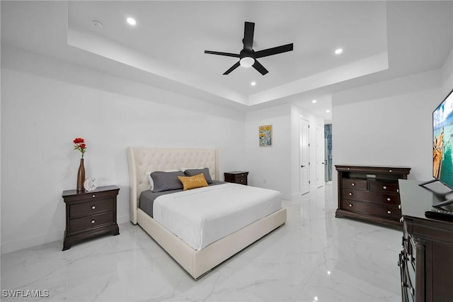 1921 SW 4th St, Cape Coral, FL 33991 - bedroom featuring a tray ceiling, recessed lighting, light marble finish floors, and a ceiling fan