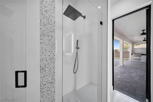 1921 SW 4th St, Cape Coral, FL 33991 - bathroom featuring a stall shower and ceiling fan