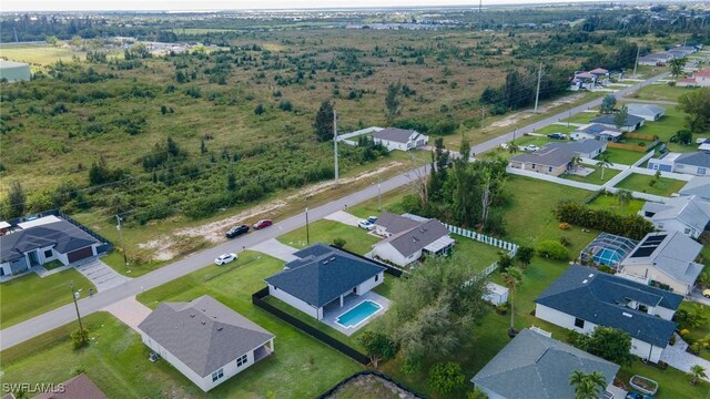 1921 SW 4th St, Cape Coral, FL 33991 - aerial perspective of suburban area