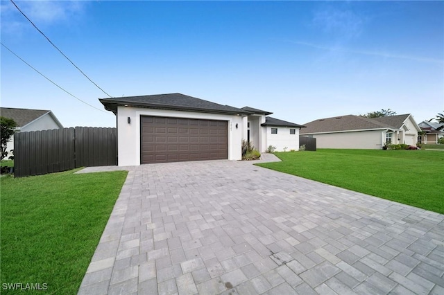 1921 SW 4th St, Cape Coral, FL 33991 - view of front of property with an attached garage, decorative driveway, and stucco siding