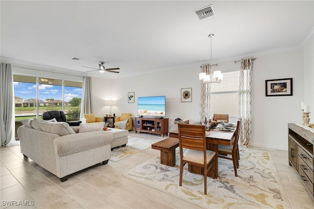 16126 Rosemallow Ln, Alva, FL 33920 - living room featuring a chandelier, healthy amount of natural light, crown molding, ceiling fan, and light tile patterned flooring