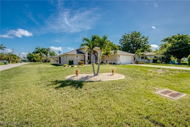 1101 SE 14th Ter, Cape Coral, FL 33990 - single story home featuring concrete driveway, a front yard, stucco siding, and a garage