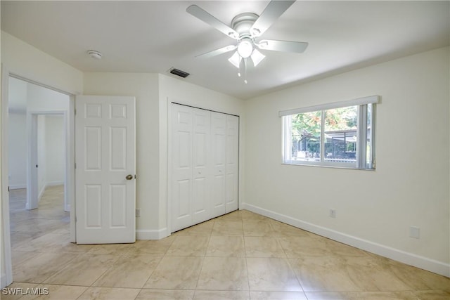 1101 SE 14th Ter, Cape Coral, FL 33990 - unfurnished bedroom featuring a closet and ceiling fan