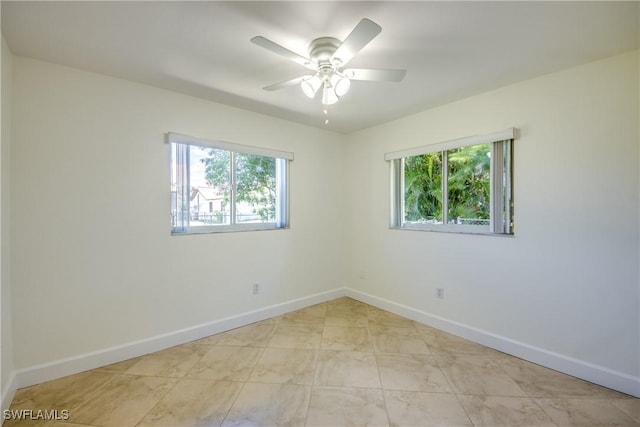 1101 SE 14th Ter, Cape Coral, FL 33990 - empty room with baseboards and ceiling fan