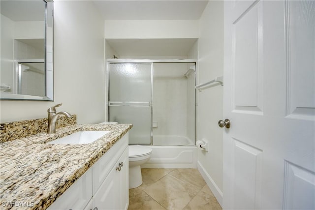 1101 SE 14th Ter, Cape Coral, FL 33990 - full bathroom featuring vanity, combined bath / shower with glass door, and tile patterned flooring