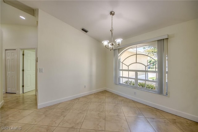 1101 SE 14th Ter, Cape Coral, FL 33990 - spare room featuring a chandelier and baseboards