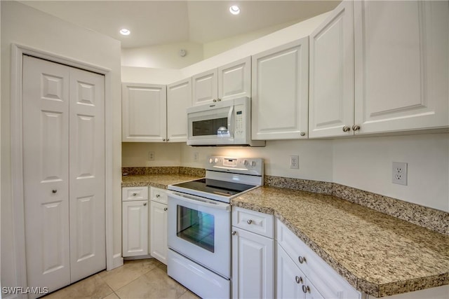 1101 SE 14th Ter, Cape Coral, FL 33990 - kitchen with white appliances, white cabinetry, and recessed lighting