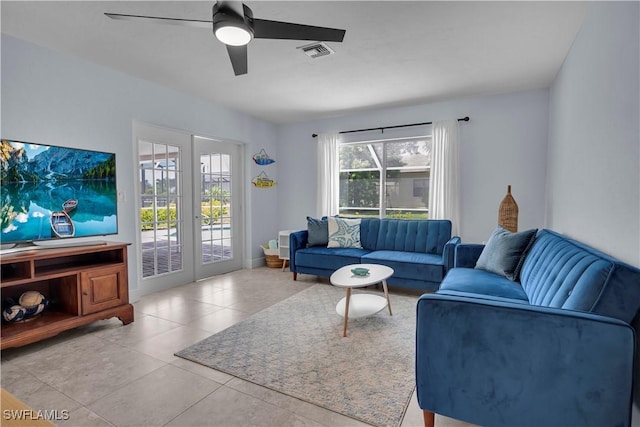 2317 El Dorado Pkwy W, Cape Coral, FL 33914 - living room with a ceiling fan and light tile patterned floors