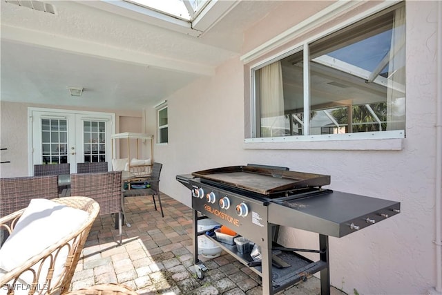 2317 El Dorado Pkwy W, Cape Coral, FL 33914 - view of patio / terrace with french doors