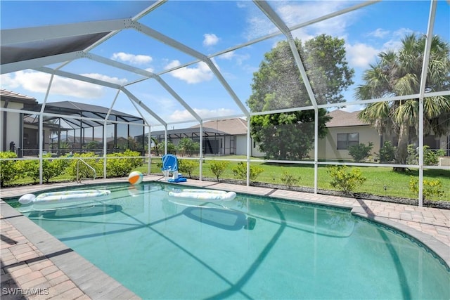 2317 El Dorado Pkwy W, Cape Coral, FL 33914 - outdoor pool featuring a yard, a lanai, and an outdoor hot tub