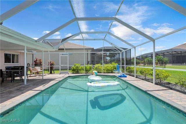 2317 El Dorado Pkwy W, Cape Coral, FL 33914 - swimming pool featuring a patio area and glass enclosure
