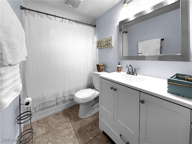 2317 El Dorado Pkwy W, Cape Coral, FL 33914 - bathroom featuring toilet, vanity, and shower / tub combo with curtain
