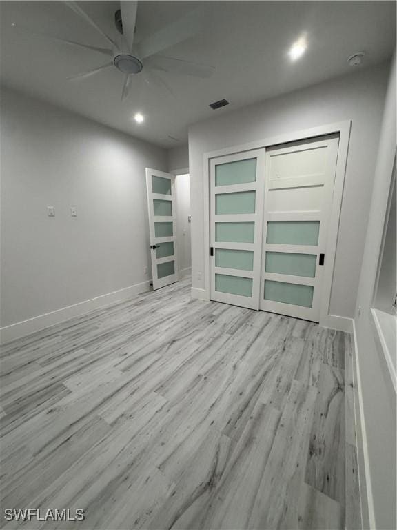 367 10th St NE, Naples, FL 34120 - empty room with a ceiling fan, wood finished floors, recessed lighting, and a smoke detector