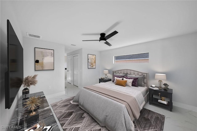 2512 10th St W, Lehigh Acres, FL 33971 - bedroom featuring marble finish flooring, baseboards, ceiling fan, and a closet