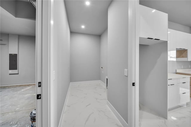 2512 10th St W, Lehigh Acres, FL 33971 - hallway featuring light marble finish floors, baseboards, and recessed lighting