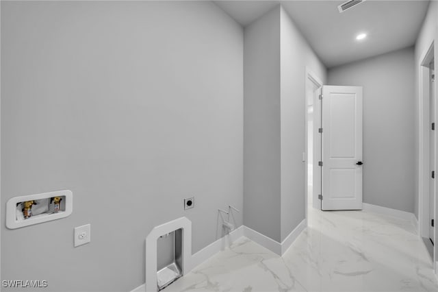 2512 10th St W, Lehigh Acres, FL 33971 - laundry area featuring hookup for an electric dryer, washer hookup, baseboards, marble look tile flooring, and recessed lighting