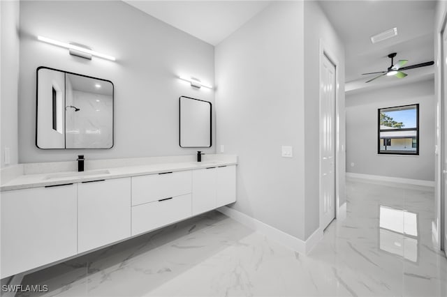 2512 10th St W, Lehigh Acres, FL 33971 - bathroom featuring marble look tiles, baseboards, double vanity, and a ceiling fan