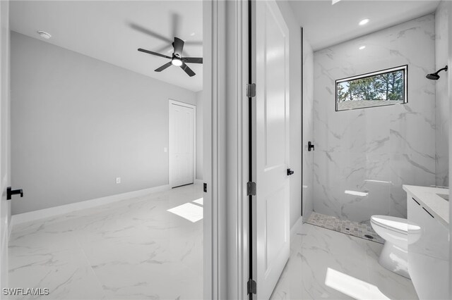 2512 10th St W, Lehigh Acres, FL 33971 - full bath featuring toilet, vanity, marble finish floors, a marble finish shower, and ceiling fan