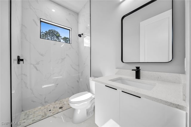 2512 10th St W, Lehigh Acres, FL 33971 - bathroom featuring vanity, marble finish flooring, toilet, and a marble finish shower
