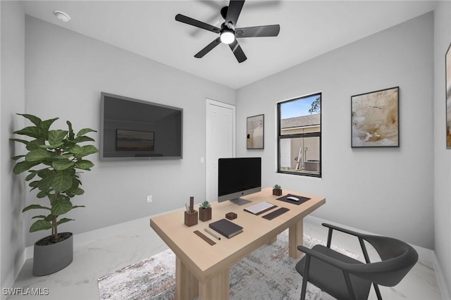 2512 10th St W, Lehigh Acres, FL 33971 - home office featuring marble look tiles, baseboards, and a ceiling fan