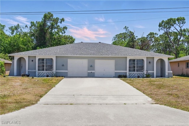 1423 SE 24th Ave, Cape Coral, FL 33990 - single story home with stucco siding, driveway, an attached garage, a front yard, and a shingled roof
