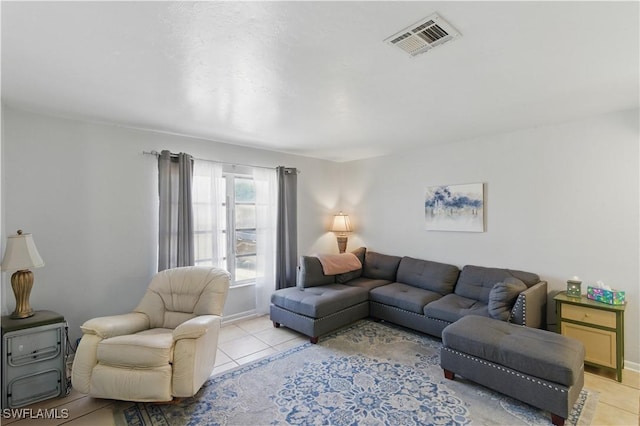 1423 SE 24th Ave, Cape Coral, FL 33990 - living room featuring light tile patterned flooring