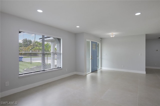 3866 Villmoor Ln, Fort Myers, FL 33919 - unfurnished room with baseboards, recessed lighting, and light tile patterned floors