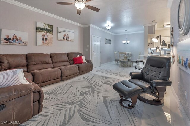 23520 Walden Center Dr Unit 207, Estero, FL 34134 - living room featuring a ceiling fan, baseboards, crown molding, and a chandelier