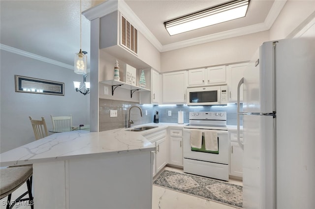 23520 Walden Center Dr Unit 207, Estero, FL 34134 - kitchen featuring white appliances, a sink, a peninsula, light stone countertops, and crown molding