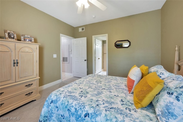23520 Walden Center Dr Unit 207, Estero, FL 34134 - bedroom featuring light carpet, a ceiling fan, and baseboards