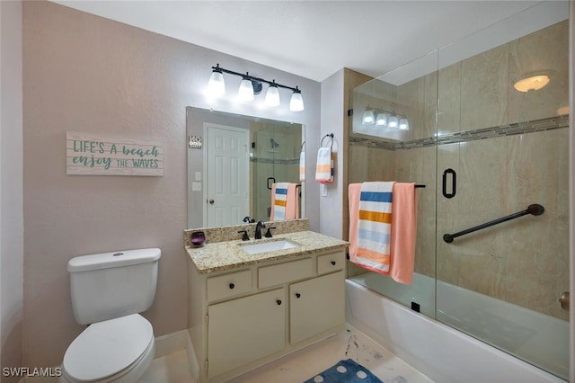 23520 Walden Center Dr Unit 207, Estero, FL 34134 - full bathroom featuring vanity, toilet, and enclosed tub / shower combo
