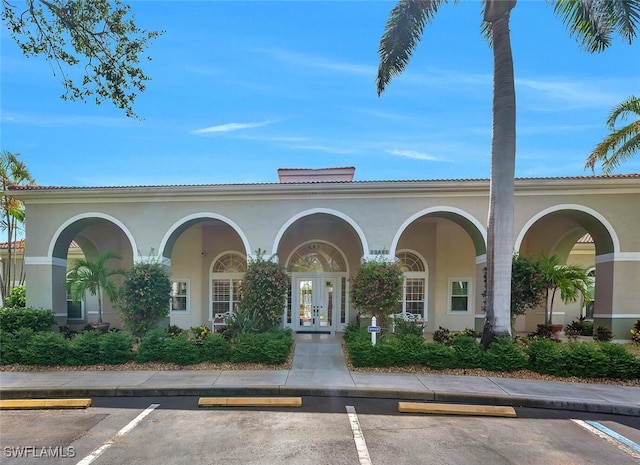 23520 Walden Center Dr Unit 207, Estero, FL 34134 - view of building exterior with uncovered parking