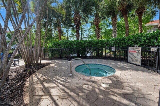 23520 Walden Center Dr Unit 207, Estero, FL 34134 - view of swimming pool featuring a community hot tub