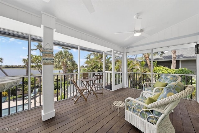1043 Sand Castle Rd, Sanibel, FL 33957 - sunroom with ceiling fan, lofted ceiling, a water view, and healthy amount of natural light