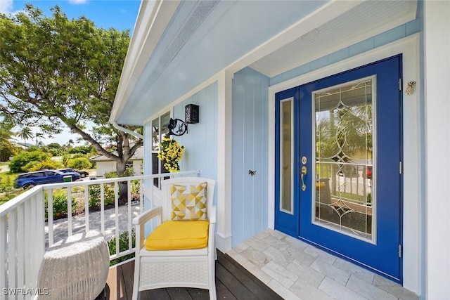 1043 Sand Castle Rd, Sanibel, FL 33957 - doorway to property with covered porch