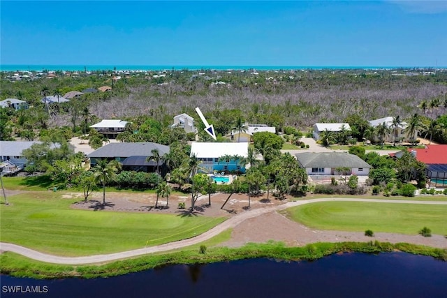 1043 Sand Castle Rd, Sanibel, FL 33957 - aerial perspective of suburban area featuring a large body of water and a golf club